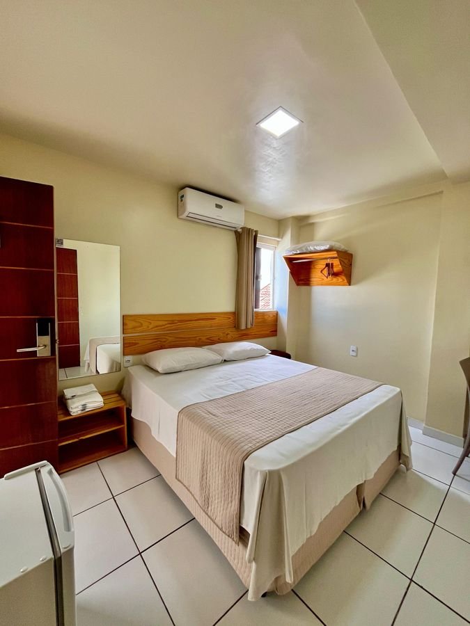 Quarto com cama de casal
