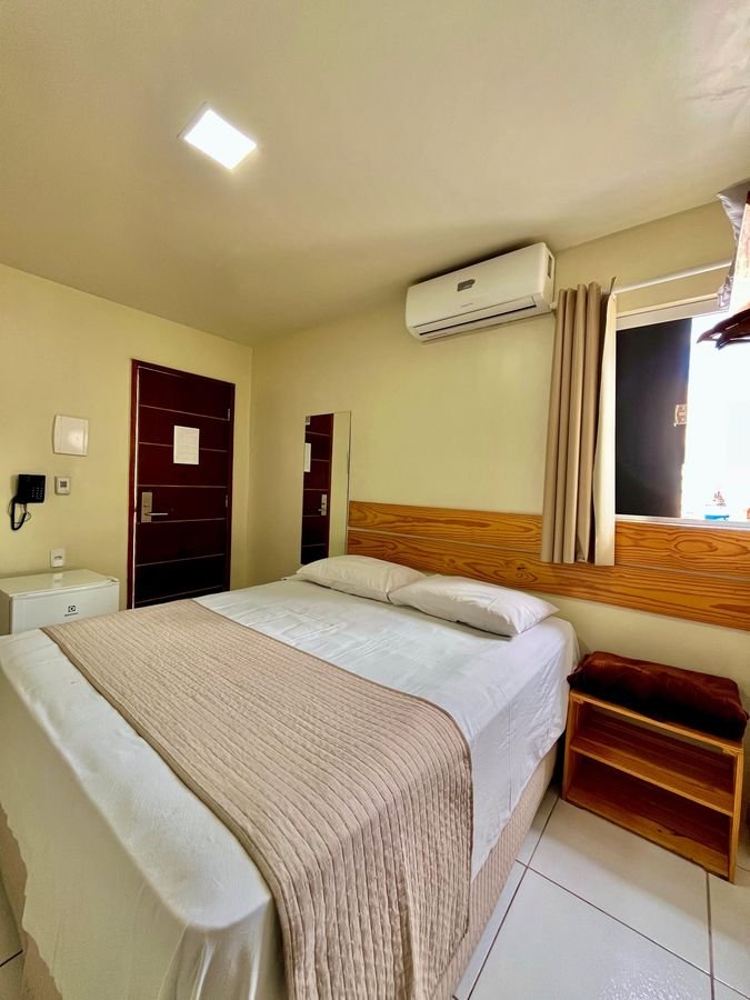Quarto com cama de casal