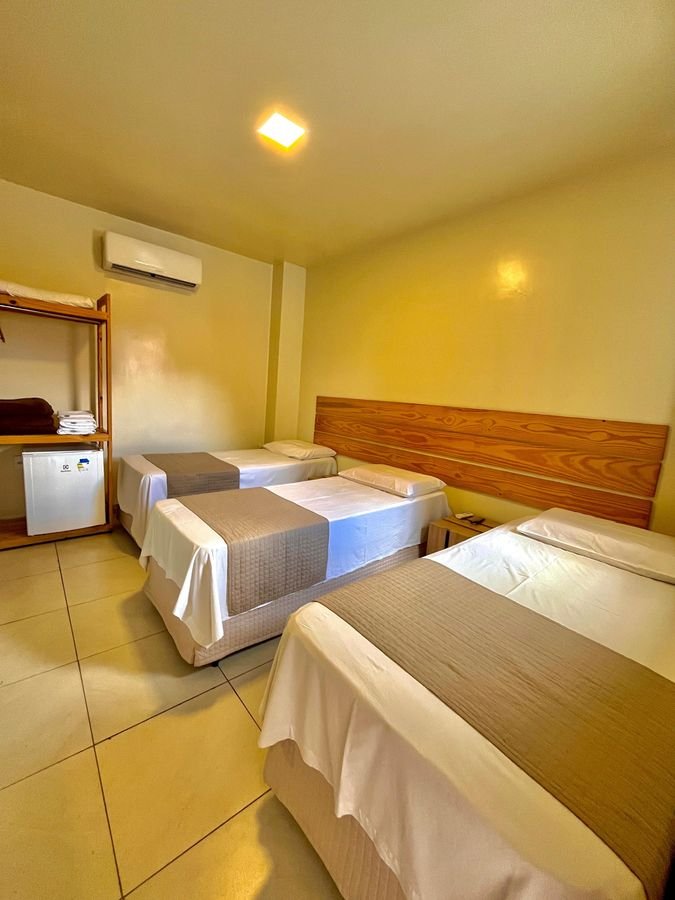 Quarto para três pessoas